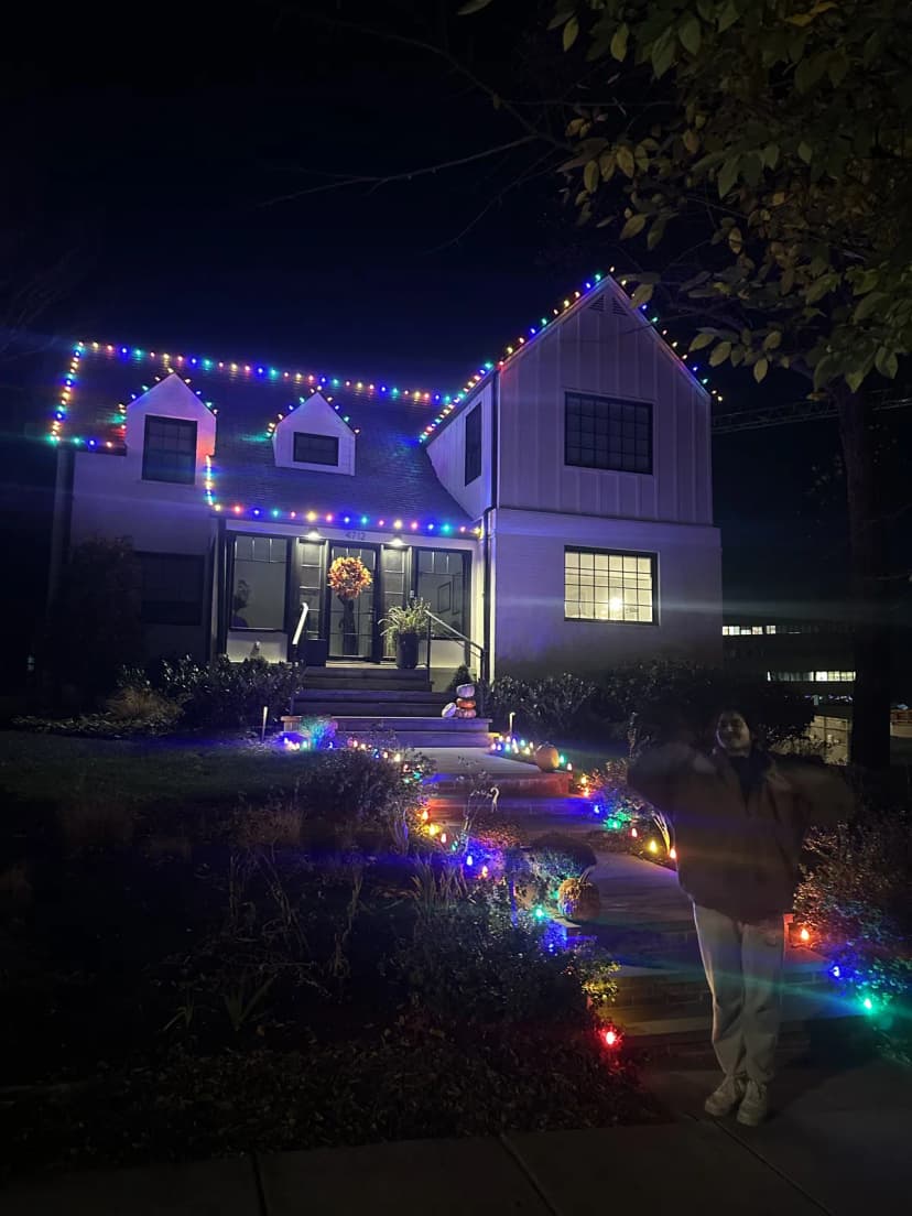 Multi-color C9 roofline on a Rockville colonial — red, green, blue & gold — LightDMV