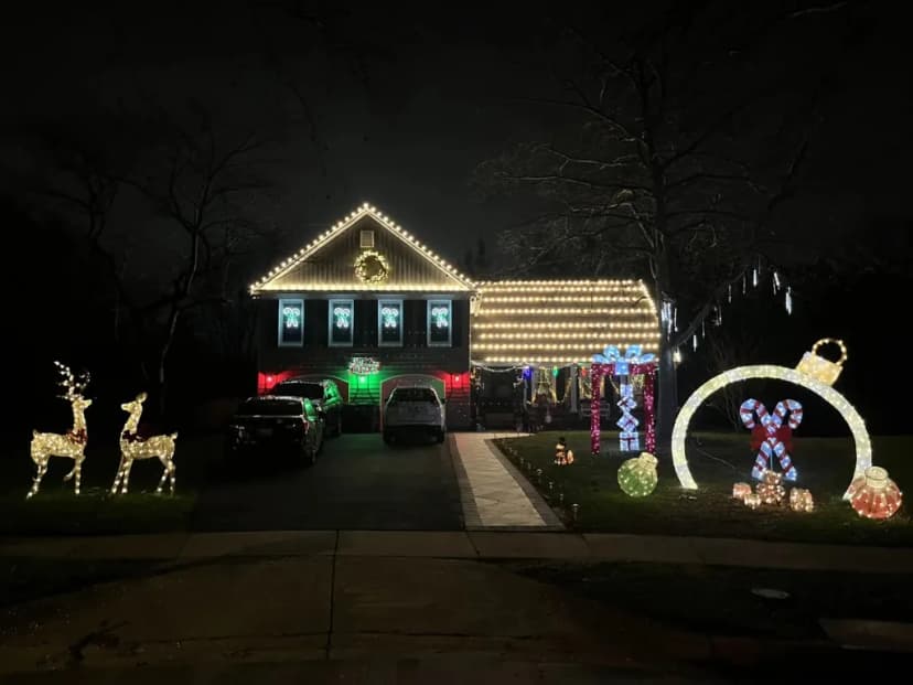 Christmas light installation in the DMV — roofline lighting with yard holiday accents