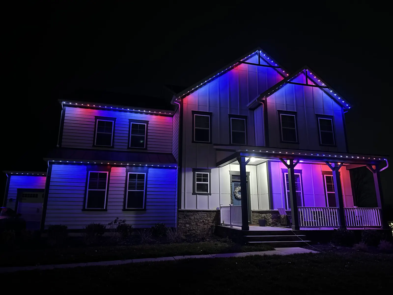 Modern home exterior with permanent LED trim lighting