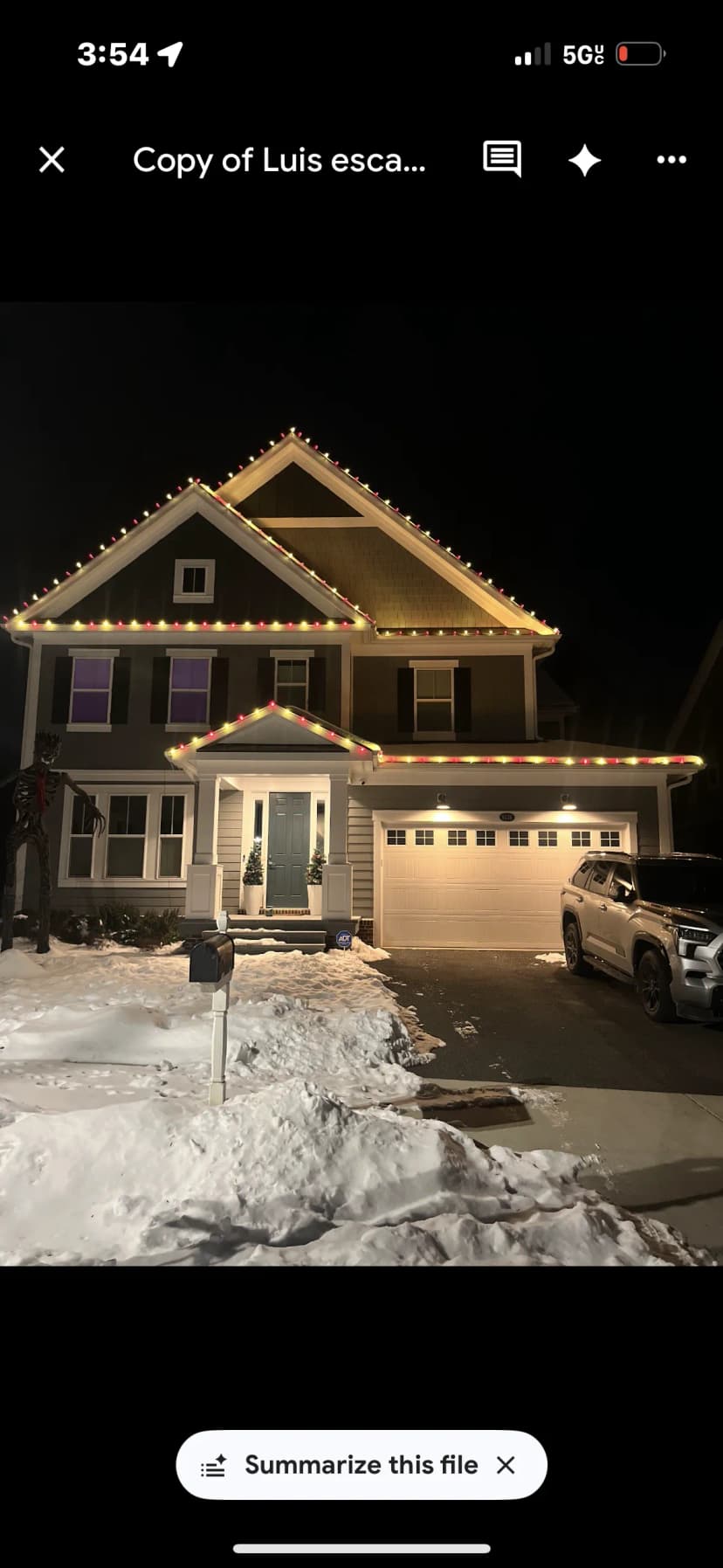 Multi-color C9 roofline on a Silver Spring colonial — red, green & gold — LightDMV