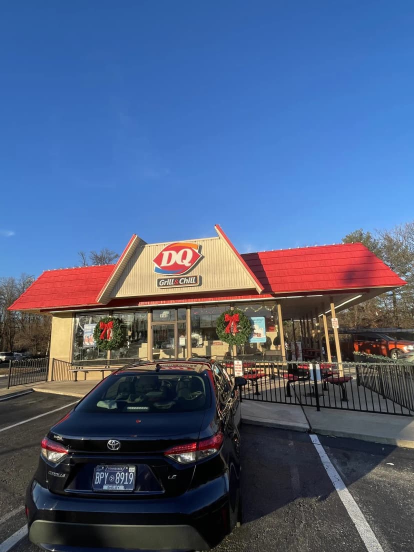 Commercial Christmas light installation on a restaurant storefront — LightDMV