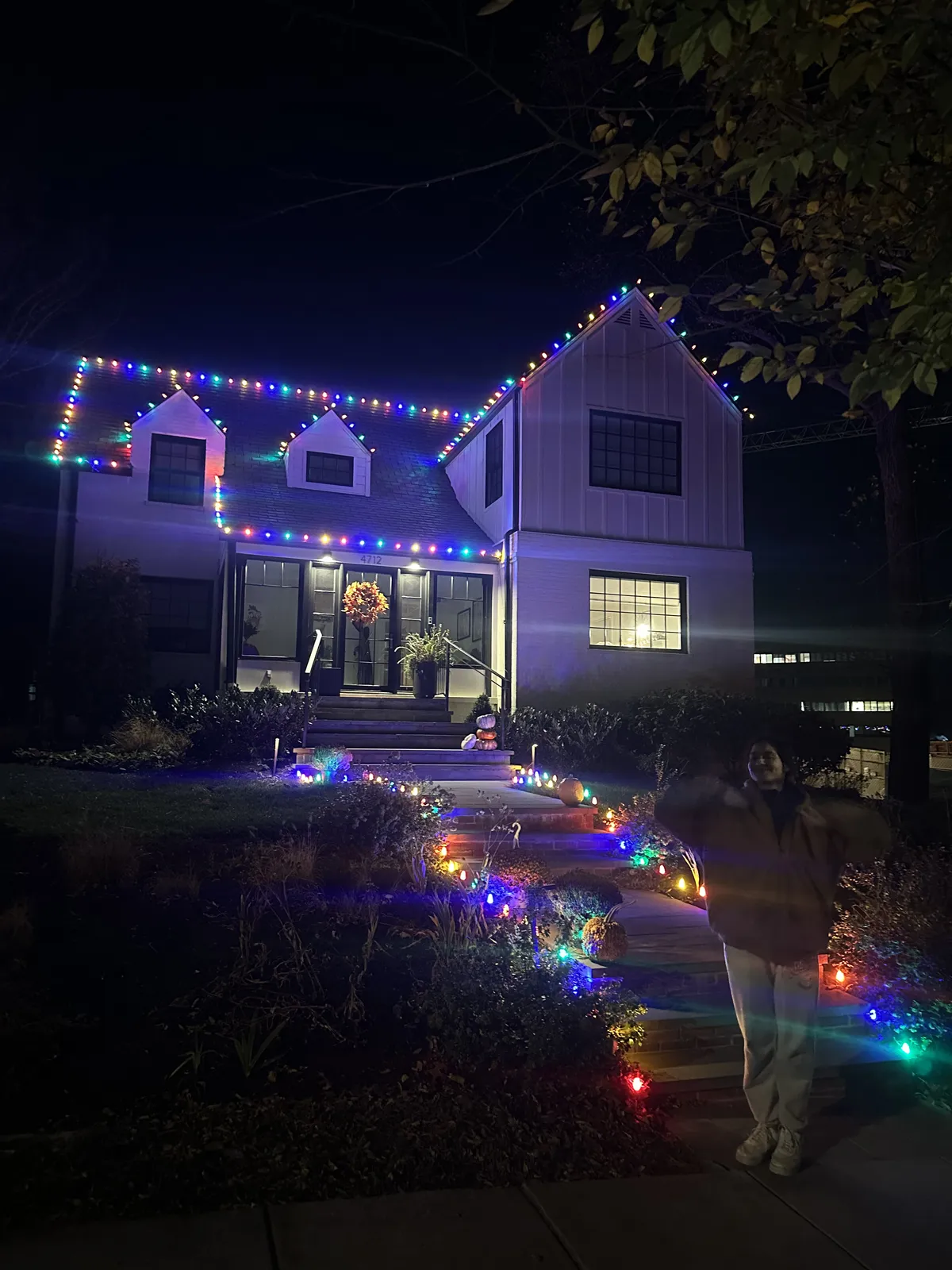 Multi-color C9 roofline on a Rockville colonial — red, green, blue & gold — LightDMV
